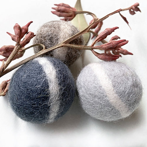 Durable felted wool balls with safe dye